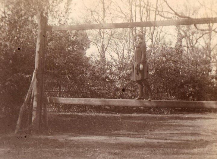 Miss Benson on gymnastics apparatus