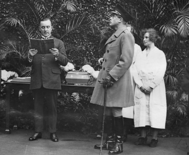 Hawksby presenting a casket of chocolates